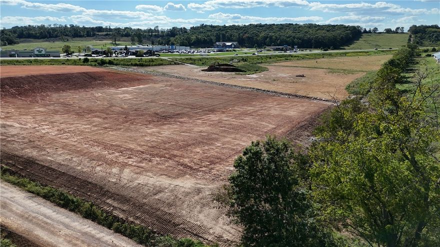 Prime 1.8 m/l acres. With over 300 feet of county road frontage and just off of Hwy. 412. Zoned dual use (DUZ) with city water/sewer, natural gas, electric, and fiber optic available on site. Desirable commercial location with high visibility in a growing area. 11,000 daily traffic count average (2023). Cleared, level with dirt work done. Across from Huntsville Walmart Supercenter and other thriving businesses. Adjoining 11 acres also available. Asking $6.00/ft2 pending a survey. Utility availability is the responsibility of the buyer or buyers agent.