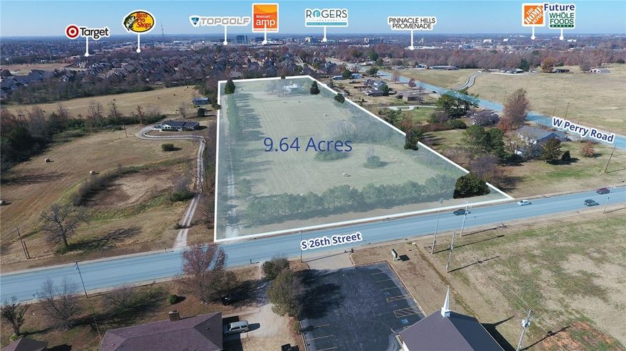 Spacious tract of land for sale located near the W Perry Road and S 26th Street intersection in Rogers, Arkansas. Desirable area near Pinnacle Hill Promenade and other big-box retailers such as Walmart, Target, At Home, and Texas Roadhouse. Popular entertainment sites nearby, including the Walmart Amp and Top Golf, create a desirable location with a high traffic volume.

**Must call broker to tour site**
