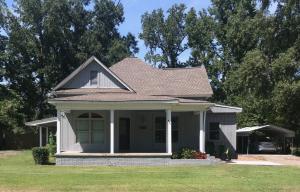 Newly Remodeled from Top to Bottom!!This 3 bedroom 2 1/2 bath home sits on a large lot in the heart of downtown Atkins. It has been completely remodeled inside and out, offers spacious bedrooms and baths, has an open living/dining concept, large kitchen pantry, new wooden privacy fence, and so much more including.....new roof, new windows, beautiful hardwood floors, new tile, new appliances, new plumbing and new wiring. This immaculate home will move fast. Schedule your showing today.Square footage was taken from ArCounty Data.