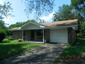 Brick home with country setting yet to town on .652 acres with beautiful rock flowerbeds, established landscaping and large shade trees. Lowmaintenance brick exterior, no rear neighbors & Northern mountain views are just a couple perks the new homeowner can enjoy. Home also hasceramic tile in kitchen and laundry rooms, linen closet and good natural light. Has a 12x 24 barn with dog run.