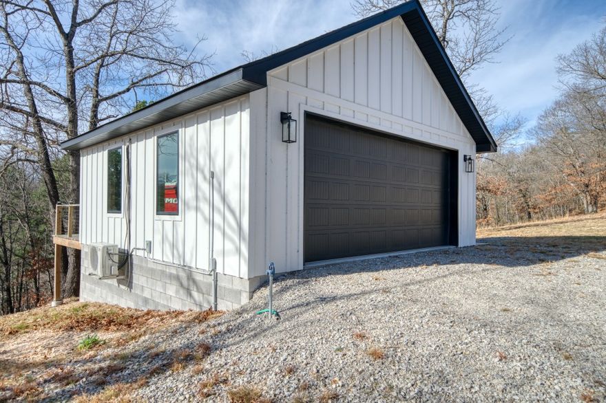 Take a look at this excellent entry into lake property ownership! This recently built 25’x25’ garage is a great place to hang out, store your lake toys, and enjoy the view of Beaver Lake. Then take a quick drive down to your dock slip without even leaving the subdivision! The 20' dock slip includes a boat lift and it’s located right next to the co-owned swim platform! This 1.2+/- acre lot has a flatter front yard than many lots in this area and a home can hook up to the community well. The garage is well finished with tongue and groove wood, electrical service, and mini split heat and A/C. Paved roads lead to this property, it’s easy to get to, and is located close to Starkey Marina. The dock is in a sheltered cove that is close to Point 5 and is centrally located to many interesting lake destinations!