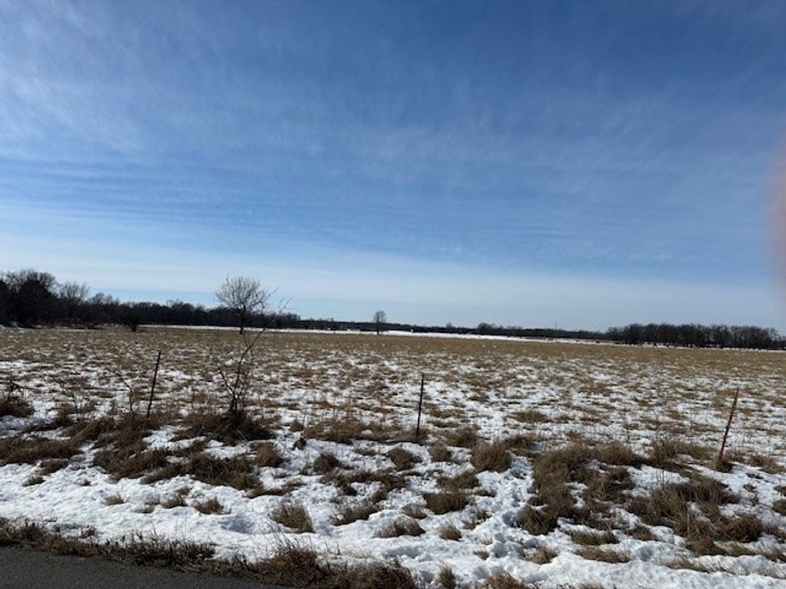 Wonderful flat, cleared aproxamatly 14.5 acres with a pond, located on a paved road just past the Mt Zion Missionary Church. A water tap will be needed and electric is close. Also available, 5+/- acres, 1530 sq.ft. Farm house, with  aprox. 20x52 shop Building, stone shed, and old barn for $330,000. Currently not listed on the MLS) Please do not disturb the occupant, this home is occupied,. This farm can be split or purchased whole.  total acres 19.81. Land listed is aproxamatly14.5 acres and will be determined with a survey for the land split.