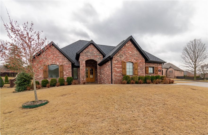 Stunning custom home in the sought after Heritage Hills gated community!  Located in the heart of NWA, you are only minutes from I-49, shopping, dining, and all that Northwest Arkansas has to offer.   Home features a beautiful open/split layout, 4 bedrooms, an office/study, 3.5 baths, spacious bonus room, 3 car garage, 48 inch Thor 6 burner gas range, large kitchen with island and peninsula, hardwood floors, 2 large exposed wood trusses in living room, massive picture windows overlooking back porch and pool, quartz counter tops, heated in ground gunnite pool, covered back porch, and so much more!