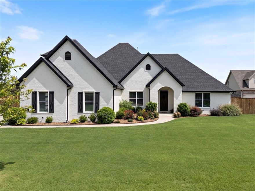 Stunning luxury home in sought-after Tontitown neighborhood! This beautifully designed 4 BR, 4.5 BA custom home offering 4100 sq ft of elegant living space on a large 1.15 acre lot in one of Tontitown's most prestigious neighborhoods.  Built in 2021 and move-in ready, this home showcases designer finishes throughout, including built-ins, upgraded appliances, and thoughtful architectural touches.  The spacious main level features 3 BR with ensuite baths, including a luxurious primary suite with a spa-like bath and an oversized walk-in closet.  A versatile office or formal dining space sits off the entry - perfect for a 5th bedroom or flex space.  Upstairs, enjoy a large media room with wet bar, plus an additional flex space at the landing-ideal for a playroom, home gym or creative workspace.  With a flat backyard ready for a pool and pool house, this property offers exceptional indoor and outdoor living potential.  Don't miss your chance to own this one-of-a-kind home in a prime location.