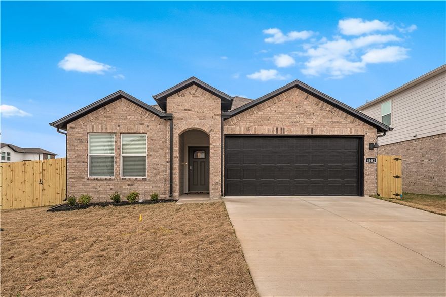 AVAILABLE NOW! Brand-new and move-in ready! This stunning 4BR/3 full BA home in West Fayetteville features luxury vinyl plank flooring throughout, stainless steel appliances, a full-size refrigerator, washer, and dryer all included. Enjoy a spacious layout with ceiling fans, ample storage, and added garage shelving. Step outside to a covered back porch overlooking the fully fenced backyard (fence not pictured). Conveniently located near I-49, the University of Arkansas, and Fayetteville's scenic parks and trails, this new construction home offers modern comfort and an unbeatable location!