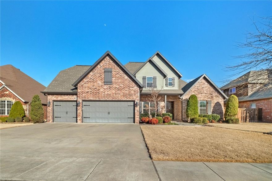 Located in the Silo Falls subdivision in Rogers, this 4-bedroom, 3.5-bath home offers approximately 3,008 sq ft of living space. Built in 2015, the home features a spacious bonus room that can serve as a media room, playroom, or home office. The kitchen includes marble countertops, a pantry, and an island, and opens to the main living and dining areas. The layout flows to a covered patio with a built-in gas grill and outdoor kitchen, providing great space for gatherings. Community amenities include a pool, playground, and clubhouse, with convenient access to nearby trails, shopping, and dining.