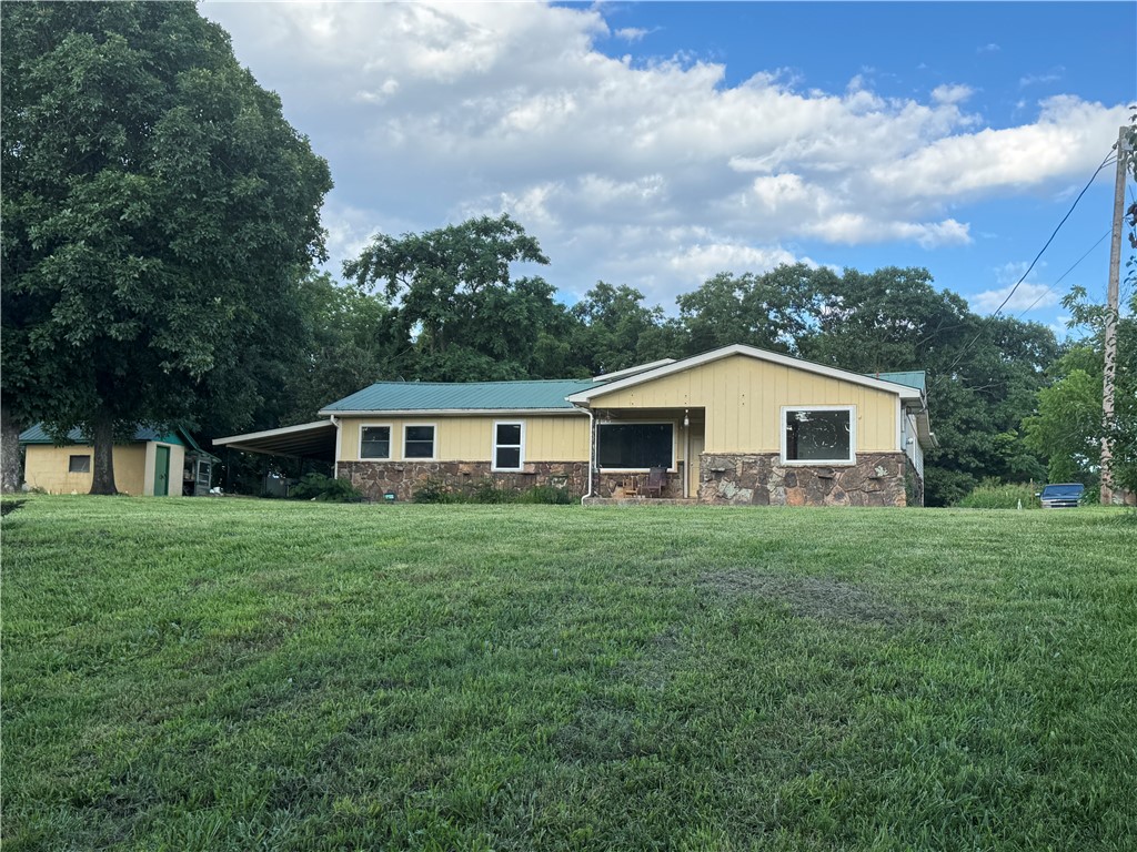 This 3-bedroom, 1-bath home sits on a nice, gently laying lot just off Scenic Highway 7 and only minutes from the historic Jasper Square. This older home is ready for your personal updates and finishing touches. A spacious addition at the back of the house—currently used as a third bedroom—offers the potential to easily convert into a fourth bedroom, second bathroom, or large family room. Whether you're looking for a permanent residence, a weekend getaway, or an investment opportunity, this property offers great flexibility.
Located close to the Arkansas Grand Canyon, the Buffalo National River, countless hiking trails, waterfalls, and all the natural beauty that Newton County has to offer. Don’t miss this chance to own a piece of the Ozarks in a prime location with endless potential!
