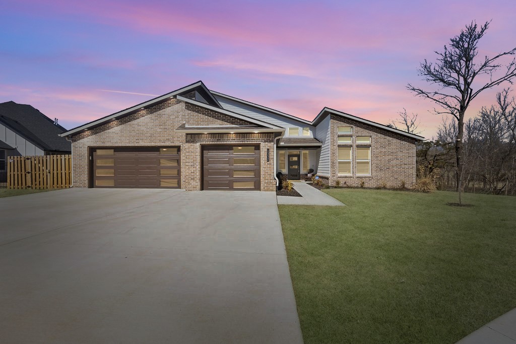 The house at 1332 Bunker Dr in Pea Ridge epitomizes modern luxury living. Built in 2023, it boasts $50,000 in upgrades, including quartz countertops, plantation shutters, designer colors, and tile, elevating its aesthetic appeal and functionality. The expansive living kitchen area, complemented by a walk-in pantry, offers ample space for gatherings and culinary adventures. With a 3-car garage and an oversized lot, this home provides both convenience and privacy.
The covered back porch overlooking Sugar Creek provides a serene retreat, perfect for relaxation or entertaining guests. Its adjacency to a golf course adds to the allure of the location, offering recreational opportunities and scenic views.
Featuring 4 bedrooms plus a bonus room that could serve as a 5th bedroom, this home provides flexibility to accommodate various lifestyles and needs. For those seeking sophistication and comfort, this property promises an unparalleled experience of luxury in the heart of Northwest Arkansas