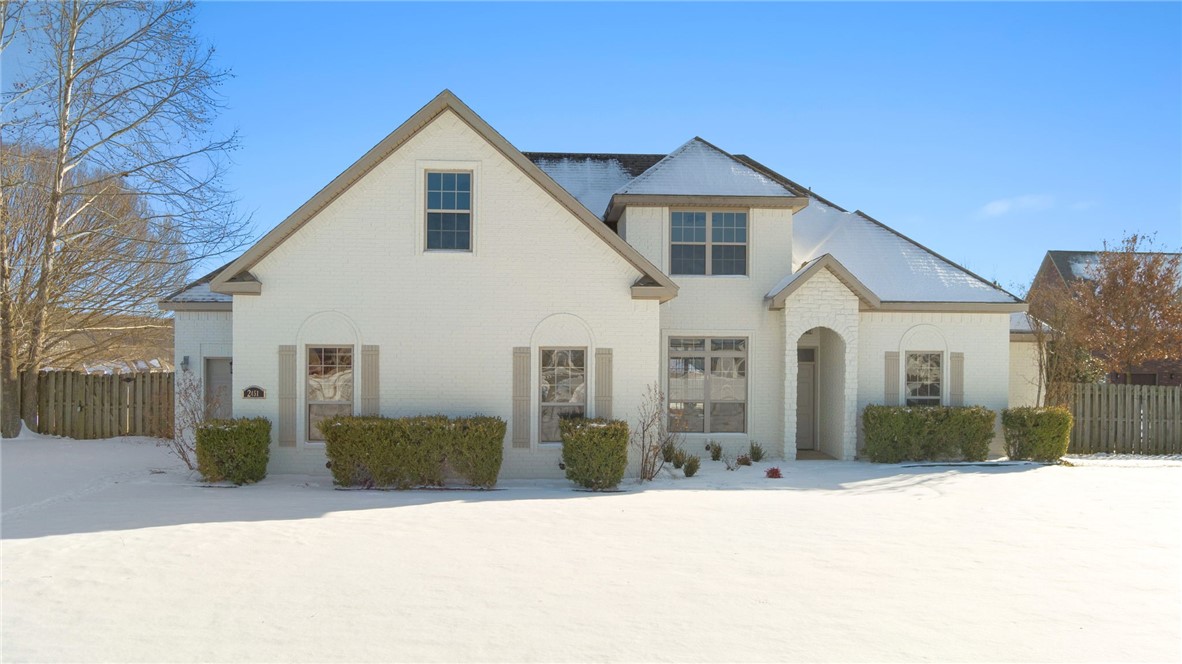 Welcome to Waterford Estates, East Fayetteville's coveted gated community! This home has so many extras! 2 living areas with fireplaces, office/study, formal dining, bonus room and a 3 car garage! The many windows provide generous natural light that gives this home a special inviting and calming feel. The POA community clubhouse, pool, fishing ponds, white river access and more make this one of the most desirable locations around! The large lot allows for plenty of room for entertaining and for additional upgrades to meet your needs whether it may be a pool, landscaping, garden, or more! Beautiful views of the rolling Ozark Mountains only 10 minutes from bustling Fayetteville center.