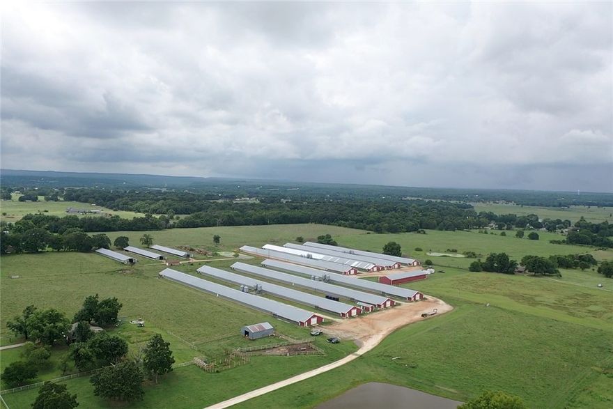 This is a rare find! Most chicken farms begin to show their age and performance falls after years 12-15. NOT THIS GEM! Barns built 20 years ago (2024) continue to operate and perform like new. Continuous updates from a committed and competitive owner have this farm in top tier condition. And the gross income proves it coming in at $790k. There are 8 43x500 drop ceiling houses built in 2004. All updates are complete. But there is more. In the past 5 years this farm has gotten new drinker lines, new heaters, fan upgrades, and insulation improvements. Operates on well water with public water backup and natural gas for heat. The really good part is the location. 15 minutes to U of A and excellent public schools! AND the city is growing towards this farm. Buy it now and make money then cash out when you're ready.