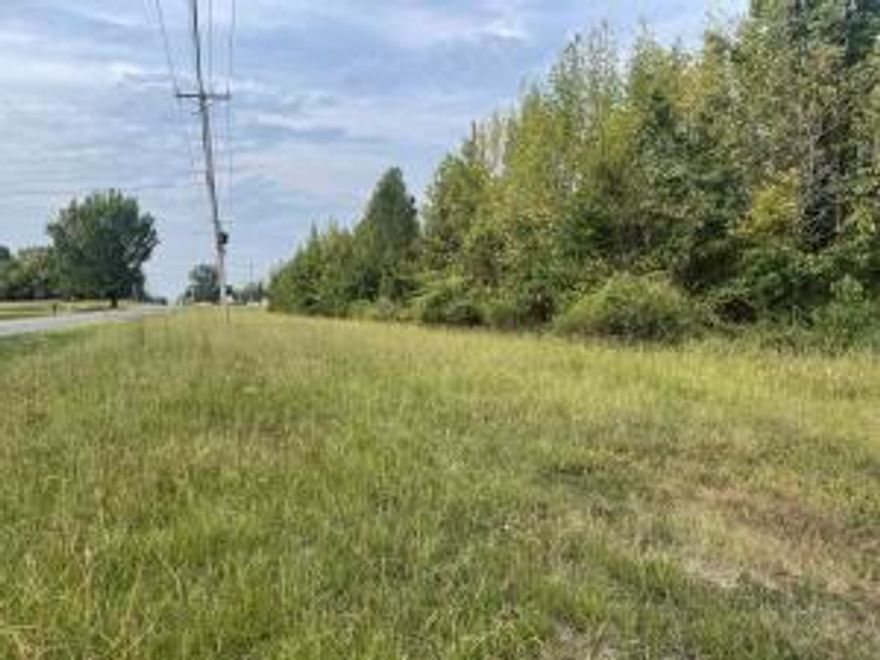 Looking for a highly visible, LUCRATIVE location for the next business adventure? Level lot offers a premier location with easy access onto and off Interstate 40. Buyer to verify the zoning and utility availability. No mineral rights.
