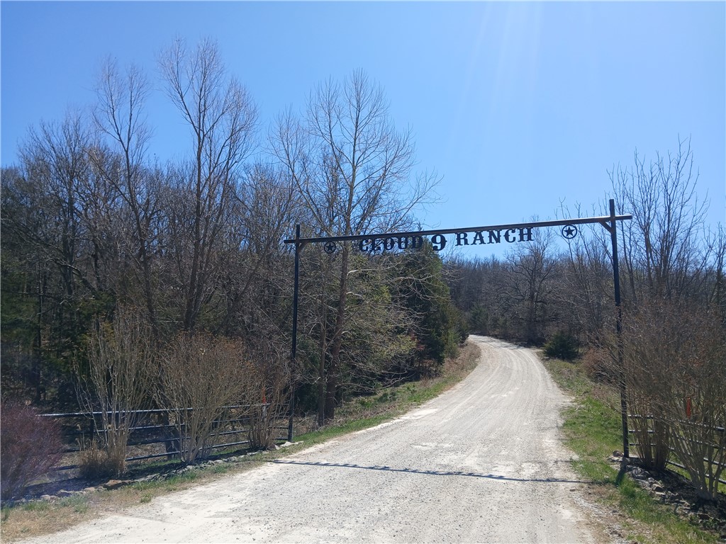 Fantastic location in a rural area. Madison County subdivision Cloud offers minimal restrictions on residential builds and this corner lot has all the conveniences of city water and electric at the road. 5.285 acres with slight slope, upper section of the lot would offer nice views and has a few pretty great building sites with clearing. Less than 5 minutes to gas and grocery convenience. 15 minutes to downtown Huntsville.