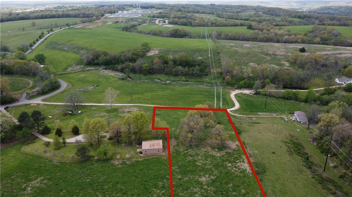 2.41 +/- acres with Tontitown water, natural gas, ozark go, and a sewer line easement. Tontitown city limits