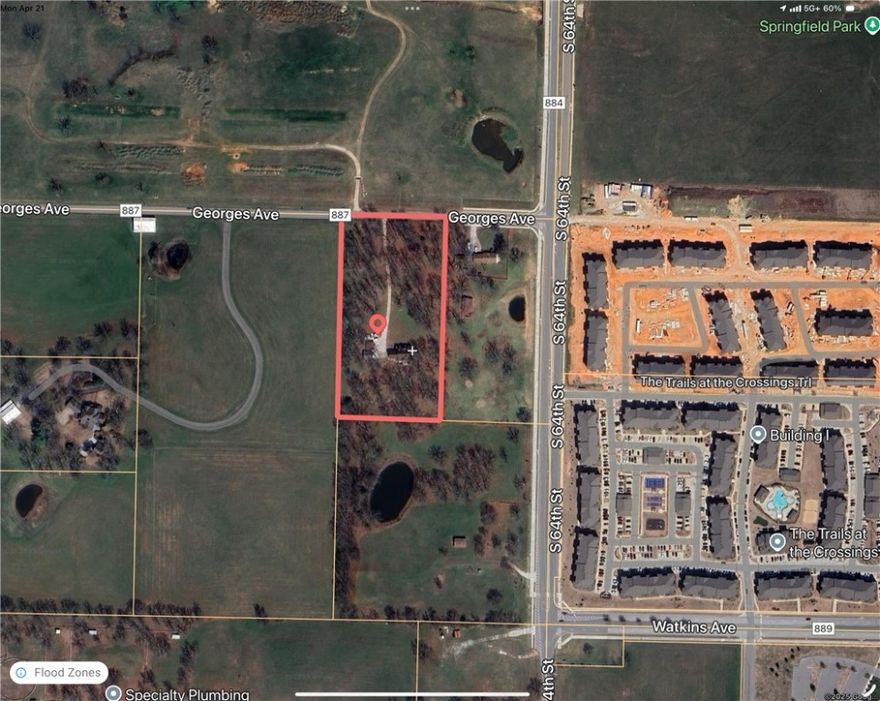 Primed for development!  Next to Arvest Ball Park, NWAC and the Springdale Heath Care Corridor.  4.86 acres with flat land, mostly cleared.  House, shop and pole barn are in good shape.  This property is just 1 minute from 412 and 3 minutes to I-49. Reference MLS 1305205, 1305206