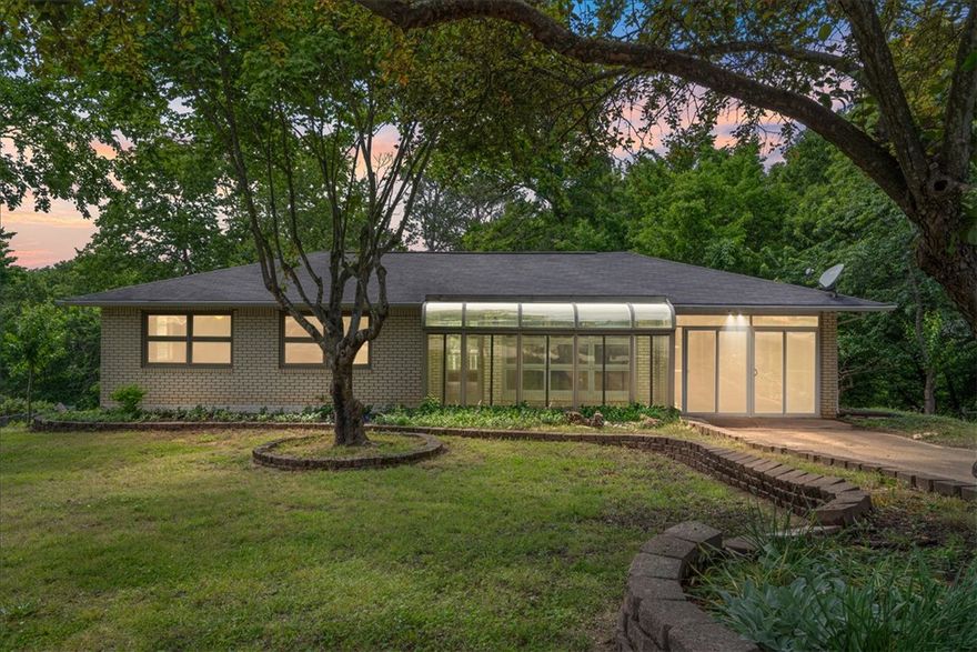 Investor opportunity in the heart of Eureka Springs! This home is full of potential and ready for someone with vision to bring it back to life. Offering over 2,200 sq ft with 3 bedrooms, 2 bathrooms, multiple living areas, a finished walk-out basement, and a spacious lot, the possibilities here are endless. Conveniently located just minutes from downtown Eureka Springs, shopping, restaurants, and local attractions. Whether you're looking for a renovation project, rental investment, flip opportunity, or a home to make your own over time, this property has the space and character to make it happen. Being sold as-is.