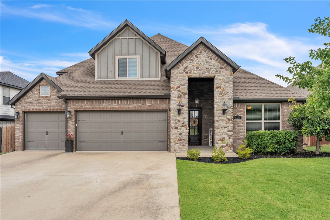 Experience the charm of this home, filled with abundant natural light and expansive open spaces. This 2 story home is adorned with soaring vaulted ceilings enhanced by stunning architectural beams and wood shiplap accent walls. The kitchen is a culinary dream, equipped with stainless steel appliances, white herringbone backsplash, and beautiful granite countertops. The massive pantry and large island create a seamless flow between the spacious kitchen and dining room, ideal for family gatherings or entertaining guests. The master suite, conveniently located on the main floor, offers a generous walk-in closet and direct access to the laundry room. Indulge in the luxurious stand-alone soaking tub and the walk-in shower in the master bathroom. This move-in-ready home ensures comfort and convenience, situated minutes away from Creekside Park and just ten minutes from Walmart HQ.