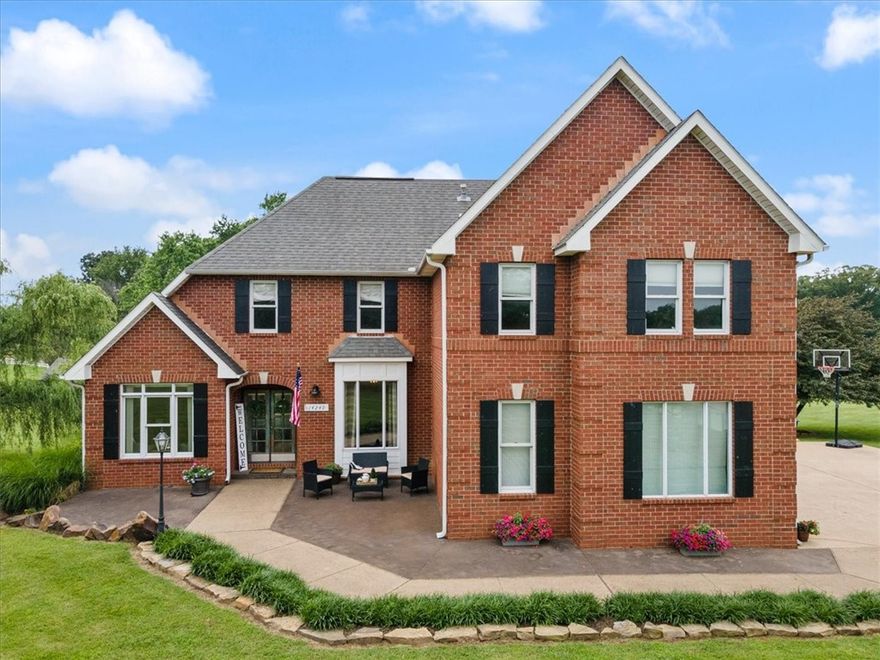 Very nice, beautiful 4 bdrm, 3.5 bath brick home w approx 2900 sq ft located on a beautiful 5 acre setting! Property also feat a nice 40 x 50 insulated metal building with 10' lean to, 4 OHD and lots of windows and an additional 20 x 25 outbuilding/studio with a 12' lean to that is insulated & dry walled with electric, 1 OHD, 10' ceiling and attic storage. This is a Better Homes & Gardens house plan that features big bedrooms-main floor has one bedroom w/ full bath and the additional 3 bdms are on the second floor. There is also an office/bonus room downstairs & an office/bonus space upstairs. Primary bathroom upstairs features a whirlpool tub & walk in shower. The 5 acres are mostly open with gradual slope to wooded section in back. Large yard space could be fenced for horses, etc. and there is a great lot space past the woods w/ an entrance from Country Club Rd that could be built on! This is a perfect home for entertaining with a large multi-level deck, wonderful landscaping and a nice above ground pool.