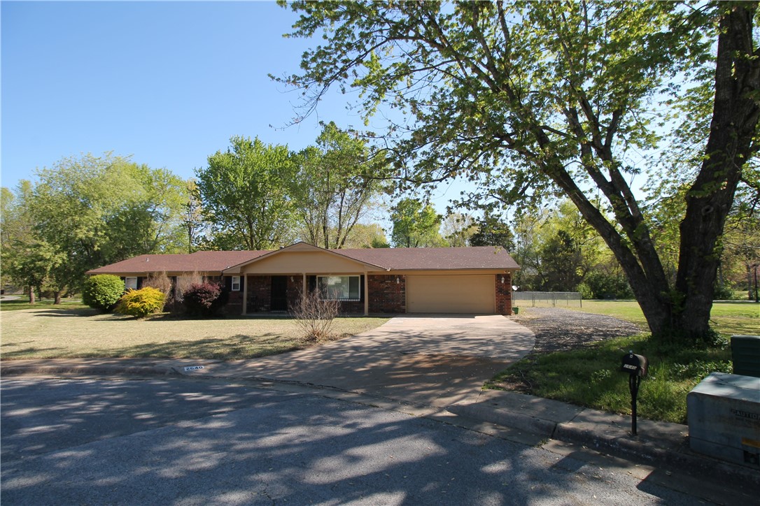 This is a Prime location in East Fayetteville on a cul de sac. The Fayetteville trail system couldn't get any closer! This large lot is rare for the area and is walking distance to parks and schools. This summer enjoy the large covered patio and fish pond in your own backyard. This home has endless potential in a much sought after neighborhood. Comfortable and spacious home with 4 large bedrooms, a bonus room, and ample living space .