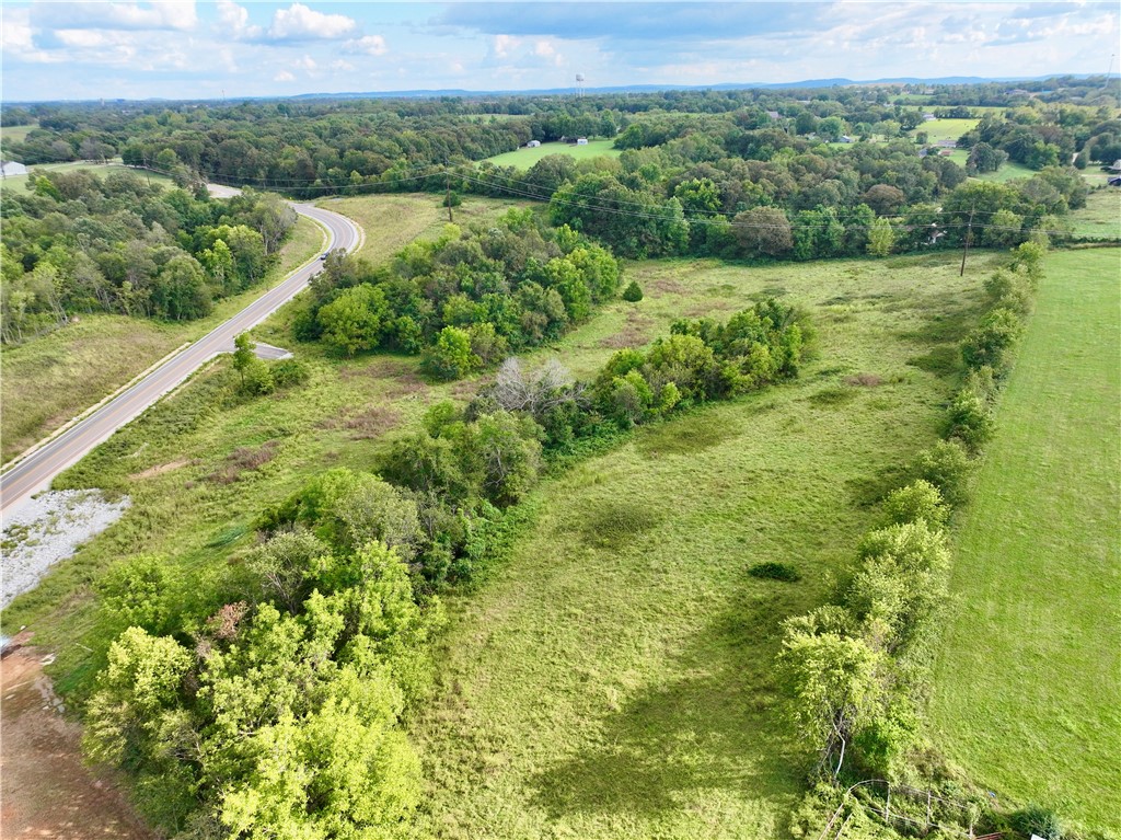 Spectacular buildable site in Tontitown! Located along the new 612 bypass & Hwy 412, minutes from I-49, Rogers, Bentonville & more. Features multiple building sites, open pasture & hardwood timber in a park-like setting. Perfect for a dream home, mini farm, or development project. Water & electric nearby add convenience. Incredible investment potential for homeowners, contractors, or developers in one of Northwest Arkansasā fastest-growing areas!