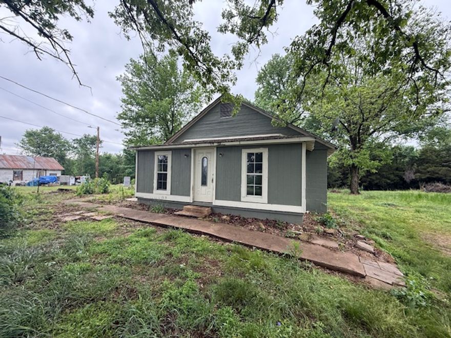 Excellent opportunity for a savy investor or a cute starter home located near schools and just minutes away from shopping. This home offers a large lot with room for the kids and or animals to play, a large deck in the rear, a laundry/mud room, a front entry sitting/mud room, a spacious, open kitchen and two bedrooms and a bathroom. This one is priced right and ready for it's new owner, update and reap the rewards! Call today for your private showing!