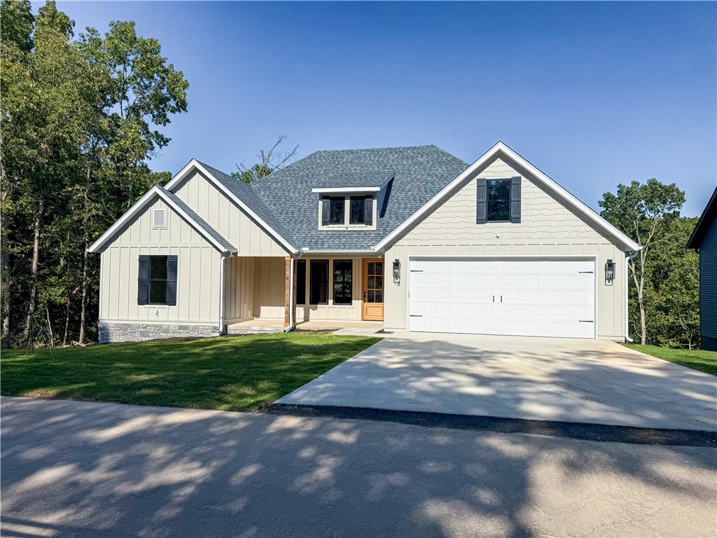 Discover the perfect mix of charm and function in this 3-bedroom + office, 2-bath cottage-style home set on a wooded 0.39-acre lot. Inside, enjoy custom cabinetry, ceramic tile, wood floors, and cozy carpeted bedrooms, all designed for comfort and everyday living. A secluded deck overlooks the trees, creating a peaceful backdrop for relaxing mornings or winding down in the evenings.
Here, recreation and convenience are just minutes away:
-Highlands Golf Course within 3 minutes
-Lake Loch Lomond only 5 minutes for boating and fishing
-Tanyard Creek Trail less than 10 minutes for hiking and waterfalls
- Walmart and shopping nearby for all your essentials