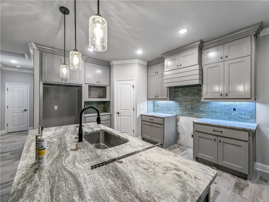 Welcome To Your Next Home! This New Build Bella Vista Stunner Will Have The Classic Charm Of A Brick Front, While The Interior Will Provide You All The Modern Amenities And Look That Aims To Please! Spead Over 2 Fab Levels, You Will Find All Of The Important Stuff On The Main Level, Including The Primary Suite, Main Living w/ Centered Fireplace And Builtins On Either Side, Kitchen With Island/Bar Seating And Eat-in Dining, Laundry, 2 Secondary Beds + Full Guest Bath. Head To The Lower Level And BINGO...A Full Secondary Living Room With Fireplace, Large Storage Closet, And 3rd Full Bath. Could This Also Be Used As A 4th Bed, Mother-in Law Or Teenage Retreat? Absolutely It Could! Both Levels Have A Fantastic Covered Back Deck To Sit N Sip Coffee, Wine, Water Or Your Favorite Beverage While Entertaining Or Just Relaxing With A Good Book. People Still Read Books Right? Either Way, We Got You! Bike Trails Are Also Just Up The Road For The Adventurous Side In You. Bentonville Schools. City Sewer. June Comp. Come See!
