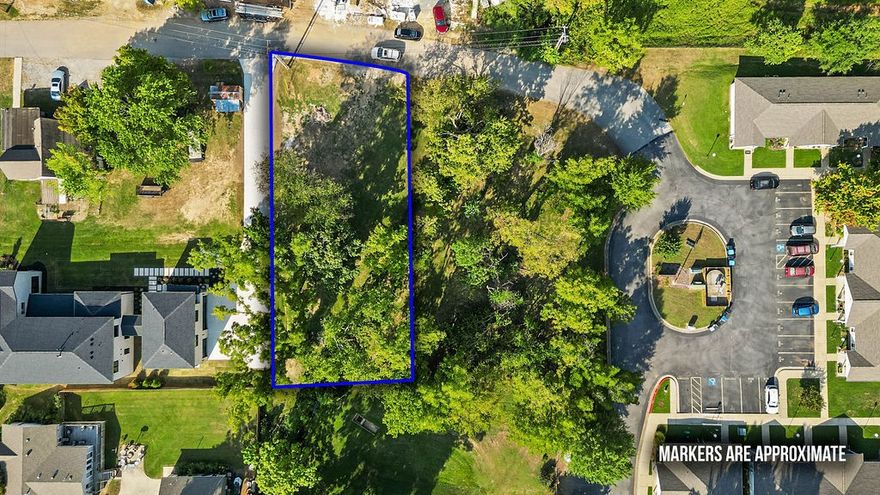 Serene park like setting with a great location. Nice interior lot <1 mile to Downtown Center, AWSOM, Crystal Bridges, New Walmart Campus and all Downtown Bentonville has to offer. Public utilities at 2nd St. Build your dream home.