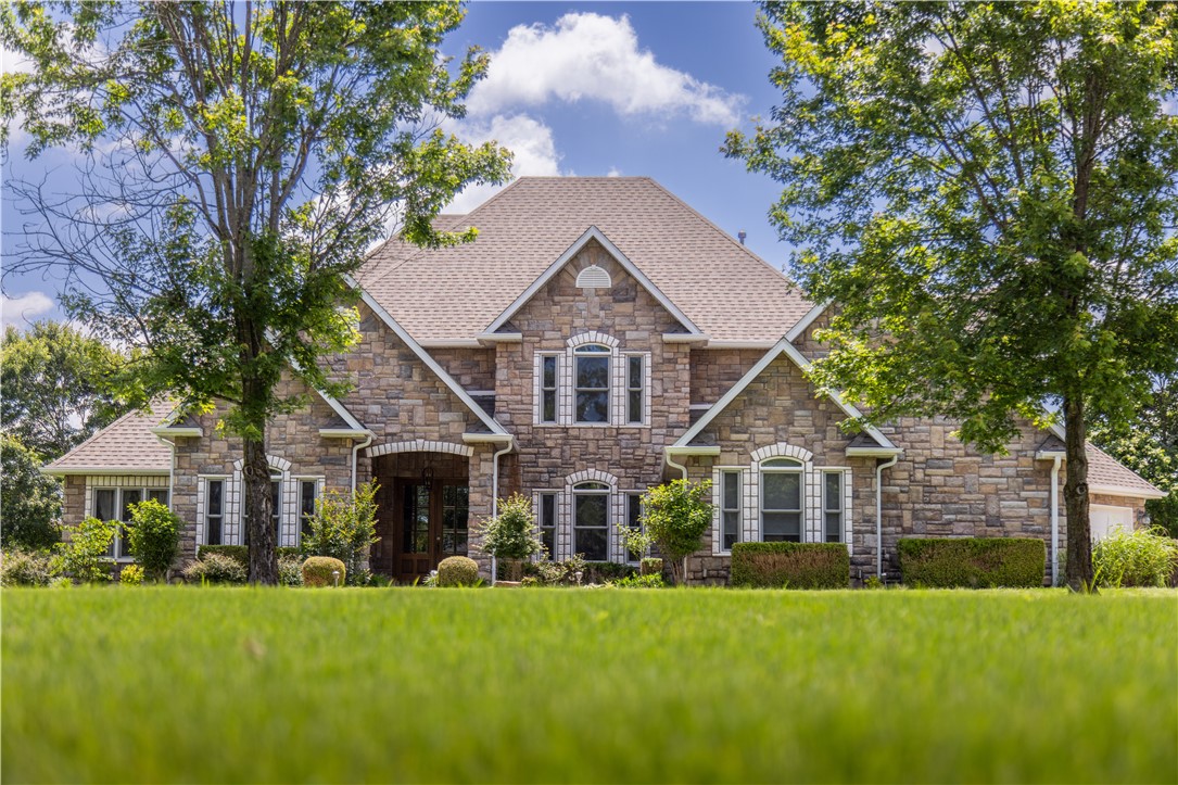 Welcome Home to refined living in East Fayetteville’s prestigious community—The Vineyards. This 4,271 square foot estate rests on a serene 2-acre lot at the back of a gated enclave, offering exceptional privacy. With 4 bedrooms and a thoughtfully designed floorplan, the home accommodates a variety of lifestyles. A soaring foyer and graceful staircase lead to elegant formal living and dining rooms, perfect for entertaining. The light-filled kitchen boasts an eat-in area and cozy hearth room, blending charm and functionality. A private home office, large storage areas throughout, and a second staircase enhance convenience. Recently renovated, this residence offers peace of mind with modern upgrades throughout. The fully irrigated, beautifully landscaped yard adds to its curb appeal. Just 6 minutes from top Fayetteville schools, shopping, and dining, and close to the vibrant Goshen community with its local restaurants, brewery, and farmers market. Luxury, comfort, and amazing location—this home has it all.
