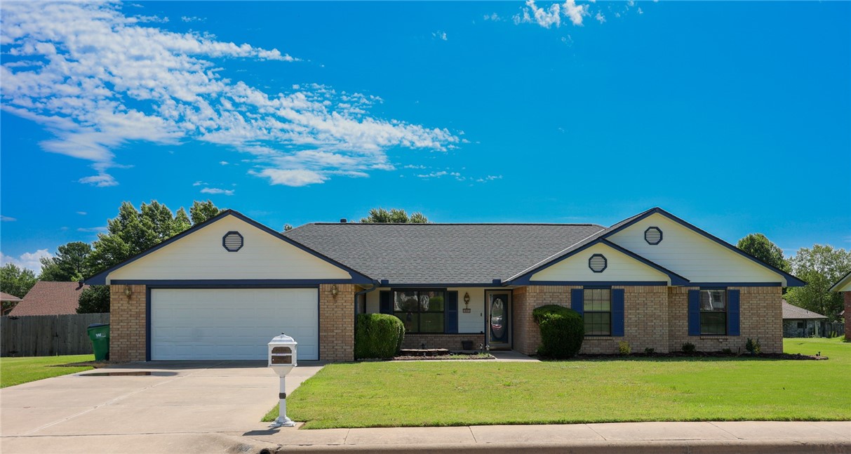 Location, location, location is what they say about real estate and this one is in prime central location. The curb appeal on this home is great with a fresh coat of paint on the exterior completed last year as well as a brand new roof in 2022 as well. As you enter you are greeted by newer flooring in 2020 and a giant Great Room with a brick fireplace and a sprawling cathedral ceiling. This room opens to the large kitchen with coffee bar/work area, large island, tons of cabinets and counter space and a huge walk-in pantry. Just off the kitchen is a laundry with an attached bathroom, cool feature. A large flex/dining room is towards the back that could be used for may things for the family. The primary bedroom has two walk-in-closets and an en-suite featuring a large Jacuzzi and separate shower. Two more bedrooms on the front of the home finish have access to the bathroom in the hallway. Out back there is a large concrete pad for outdoor seating, fenced big yard and 120 SF storage building with electricity.