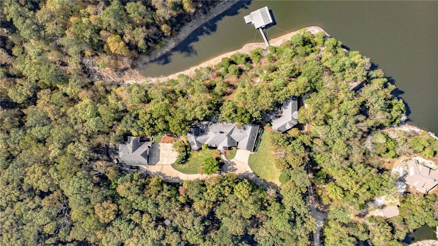 Luxurious waterfront estate on Beaver Lake with two slip private boat dock! 4 separate & stunning homes spaced along the property- perfect for entertainment lovers or potential business/investment opportunities. Enjoy the spectacular sunset with the best view on the lake from the large back patio, lake activities with direct lake access from the private dock, or relaxing evenings in the hot tub overlooking Beaver lake. Various upgrades and amenities throughout all 4 homes, thermador professional appliances, meticulous stone detail, and so much more. Perfect location with convenience to surrounding cities but ample privacy. Separate 3 bed, 2 bath 1,300 sq ft fixer upper included with purchase (on separate parcel)- pictures not included. 5 Total homes included in purchase. Agent related to owner. Please see detailed property map in attachments.