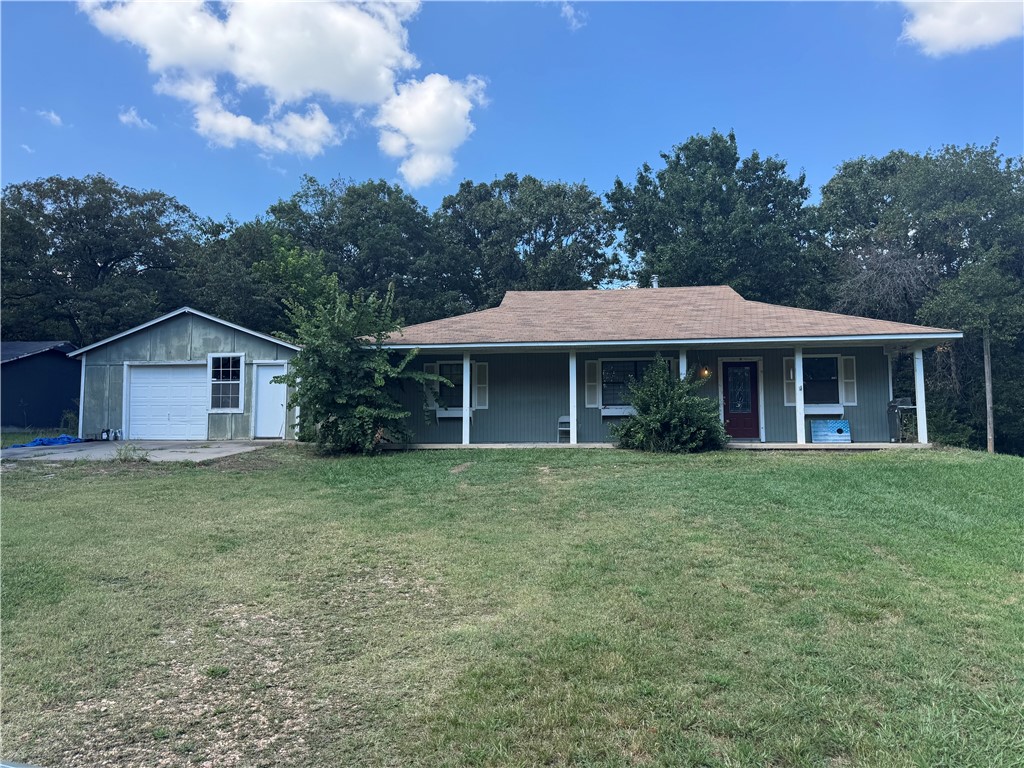 Charming fixer-upper on just over an acre, offering plenty of potential to make it your own. This home features a desirable split floor plan and a cozy wood-burning fireplace that creates a warm focal point for the living space. A storage building is included, providing extra space for tools, equipment, or hobbies. With a little vision and care, this property can be transformed into the perfect home while enjoying the privacy and space of over an acre of land. Home will not finance, cash only AS-IS.