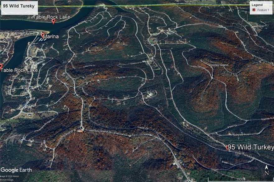 Ready to build your dream home? Quiet and gently wooded, this lot offers the best of both worlds. Enjoy the amenities in Holiday Island like golf courses, a country club, swimming, tennis and a marina with a fishing dock or watch the local fauna from your deck! Nearby Eureka Springs or Rogers offers great shopping and vibrant cultural hubs.