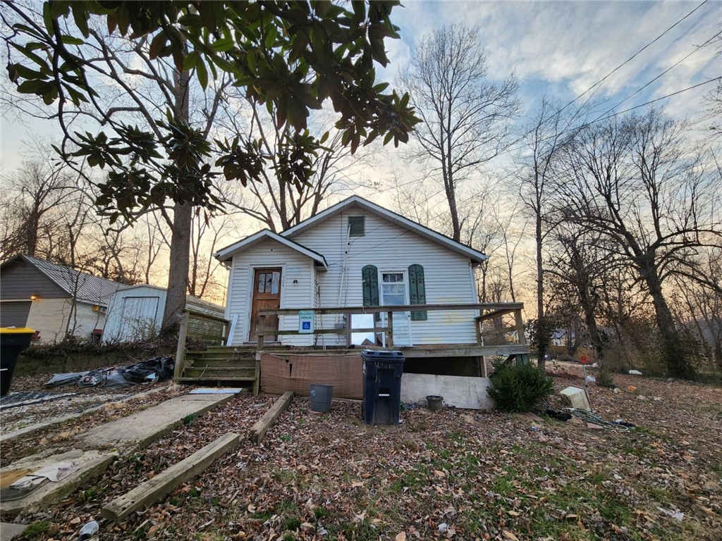 This home has good bones - walls and floors. Roof is in good shape.