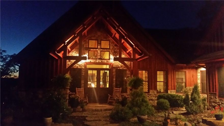 CYPRESS BUILT HOME! Custom design for executive retreat, Cypress is impenetrable by insects and moisture. Walk out from gourmet kitchen and great room deck overlooking Beaver Lake. Radiant heat through out, Including Garage.  Safe room features all metal surround including gun safe in floor. Pub features full bar layout, sinks, gas pump lights and mosaic in floor at legal distance for darts. WIDE gallery to lower level. 1000's of spring bulbs and MANY specimen estate trees. 20 min. to Eureka Springs