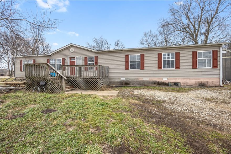 Come check out this large 3-bedroom 2-bath manufactured home sitting on 1.35 acres. Home boasts an open floor plan with a fireplace and great storage. Situated close to local amenities, schools, and shopping centers, while still providing privacy. You won't find many homes at the price in NWA.