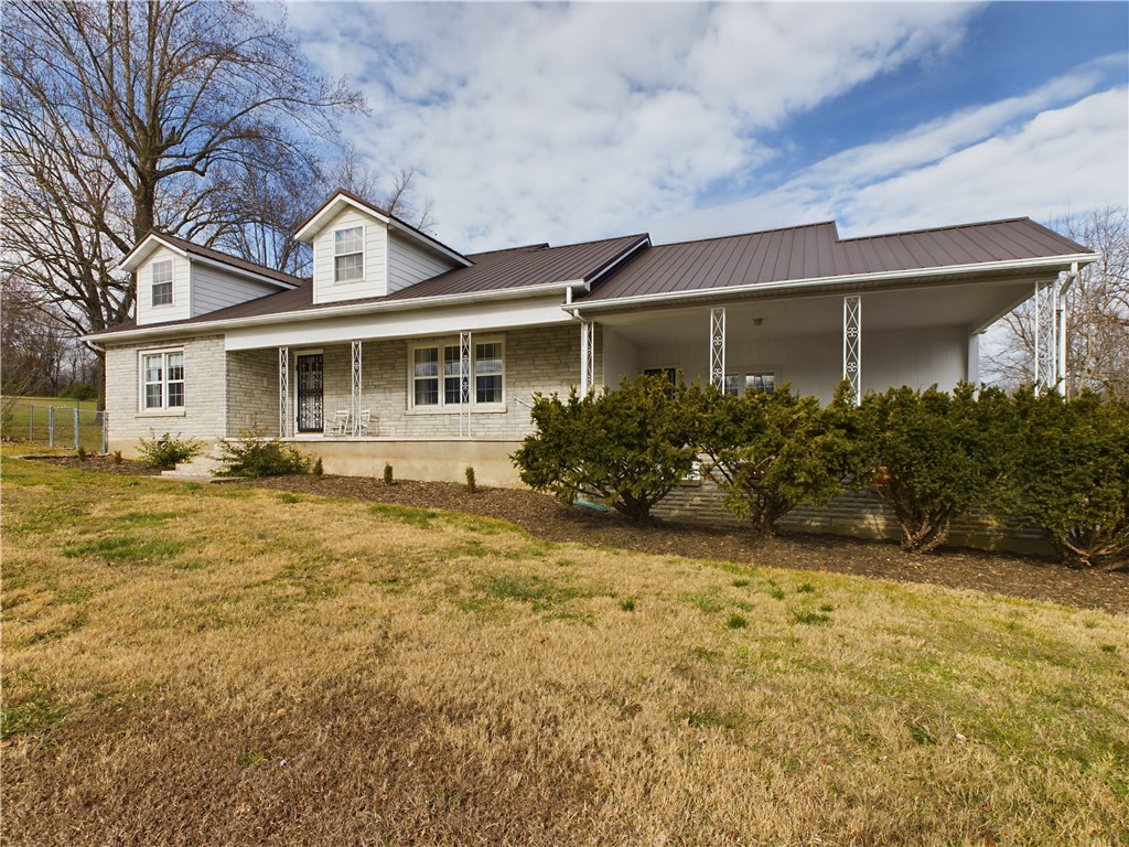 Discover the perfect blend of space, comfort, and convenience at this stunning 2,623 sq. ft. home in Harrison, Arkansas. Boasting 4 bedrooms and 3 full baths, this beautiful residence sits on two serene, park-like acres, offering the privacy and tranquility of country living while being just moments away from schools, shopping, and local amenities. Whether you're enjoying family gatherings in the spacious living areas or relaxing outdoors amidst the lush greenery, this home has it all. Don't miss your chance to own this gem in a highly sought-after location!