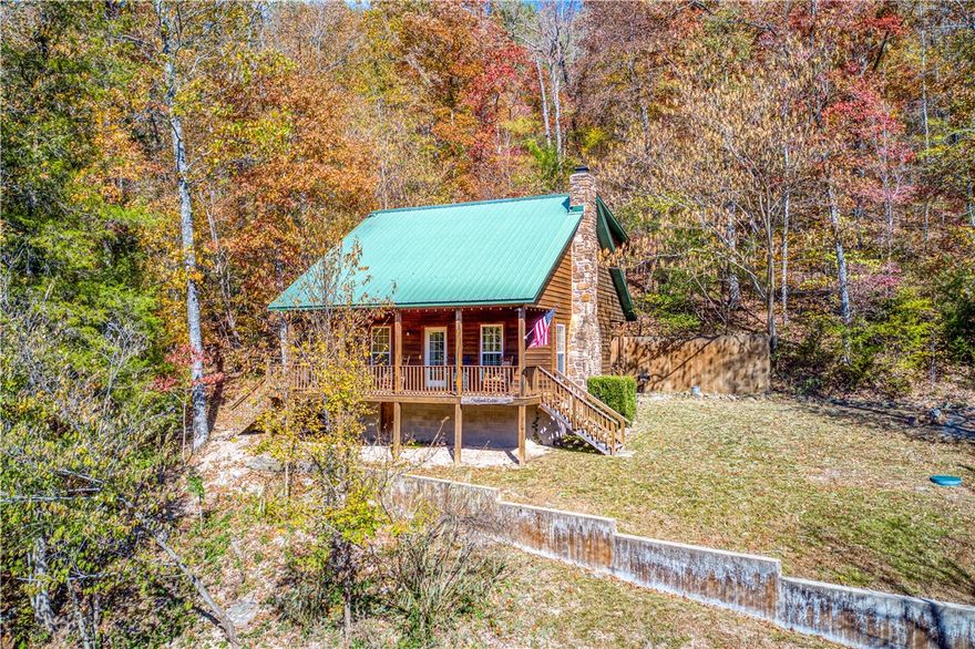 Relax and make memories with this 1215 SF 2 BR + loft BR and 2 full baths true Ozarks cabin! All the appliances and furnishings convey. Excellent nightly rental history. Secluded but less than 5 min to Jasper. Creekside is great to play or basecamp for floating (Buffalo less than 10 mins), hiking or other Ozarks adventures. Front covered deck overlooking the spring fed rock bottom "Spider Creek". Dining and living rm are open concept with the kitchen. The living rm has been recently updated with new leather couches and love seat, flat screen smart tv. Also downstairs is the king size bed with luxury mattress, full size bath with tub/shower combo. Upstairs is full private BR with lux queen bed, flat screen smart tv and steps away from full size bathroom. The loft BR suite includes 2 twin beds, brand new sleeper sofa & game room. There is also a smaller deck off the loft with seating overlooking the trees and creek! Located about a 1/4 mile down a Very well maintained gravel road.