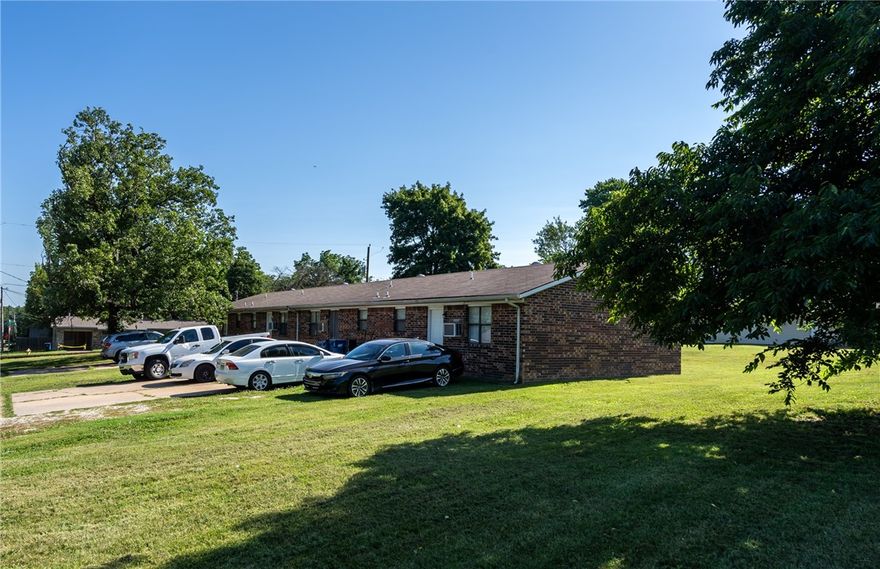 SOLD AS A PACKAGE ONLY with MLS#1221112! Attention investors, this will create an incredible investment opportunity minute from Walmart Home Office.  Own this entire block of Multi Family Dwelling (o.4 acres per each 4plex). Walking distance to downtown Bentonville. Let the property derive income while planning for future use of this large tract of land. Properties such as this rarely come up for sale. 1 unit ready to view & with an accepted offer Showings of other units will be scheduled. SOLD AS IS. All offers will be reviewed by 6pm 6/27/22.However, the seller reserves the right to accept an offer at any time. SOLD AS A PACKAGE ONLY with MLS#1221112.