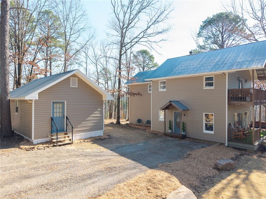 Cozy Cottage on 40 acres nestled in the pines with trails to explore & abundant of wildlife. A Hunter's Dream! The main home has 2 primary bedrooms & 2 baths upstairs. One primary bedroom has 2 walk in closets & walk out covered porch. 1 full bath downstairs.. Tongue and groove ceilings throughout most of the home & real wood flooring throughout. Large living room with built ins, tons of natural light & a real wood stove. Home has been completely repainted. Dining room is spacious with tons of built in shelves. Kitchen has gas range, new dishwasher, eat in area and a butlers pantry with sink and butcher block countertops. 2 large covered decks with new modern railing. Metal roof. 3rd bedroom is in the 425HSF detached mother in law suite with full kitchen and bath. Square footage for this 3rd bedroom is not included in the home square footage. 20x20 workshop. All 3 bedrooms are masters. Small storage building. Lean too for lawn equipment. 2 car detached carport. Appraised for 485k in Dec 2025.