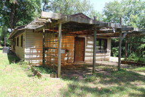 Just on the edge of Russellville. Home on a hill with privacy. Detached carport. Add a bit of elbow grease, and have a wonderful home!