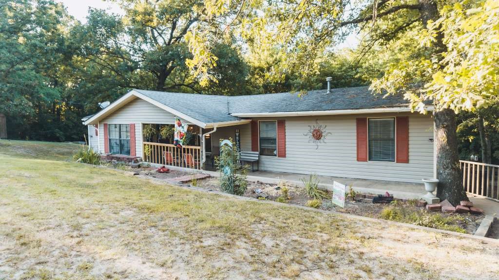 Well maintained 4 bed, 2bath home located just off I-49. New paint, added extra living space. Huge living room.