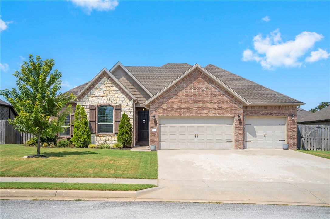 Welcome to 241 Cisterna Drive! This 4 bed, 2 bath, 2,079 sq ft home blends comfort and convenience just minutes from the Walmart Home Office and all that Northwest Arkansas has to offer. Step into a spacious living room filled with natural light, perfect for gatherings or quiet evenings. The eat-in kitchen features bar seating for casual dining and everyday connection. A split floor plan ensures privacy, while the screened-in back patio offers a peaceful retreat. Out back, the flat yard is ideal for play, gardening, or entertaining. With its thoughtful layout and unbeatable location, this home is ready for you to make it your own!