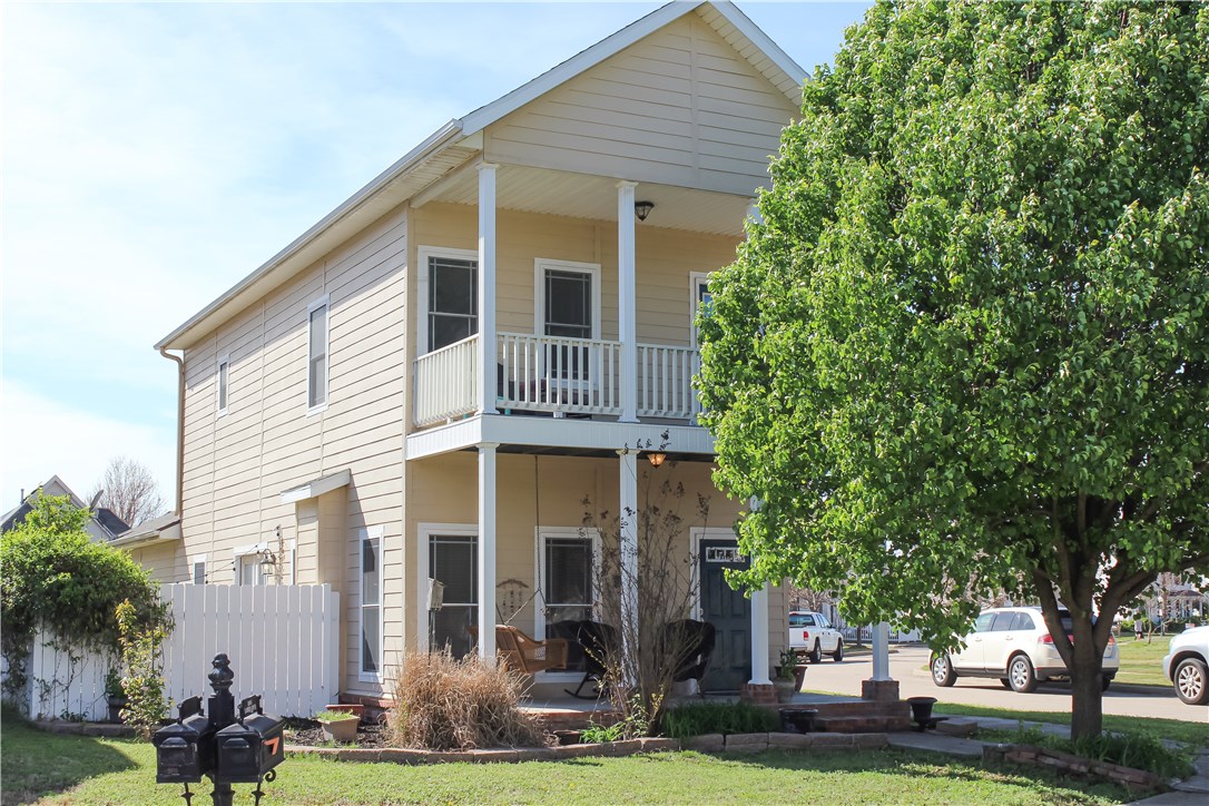 Live within walking distance to elementary/middle schools & Fayetteville bike trail! This 3 bedroom 2 bath home has a newly remodeled kitchen, new flooring downstairs, and has been beautifully repainted. Enjoy the beautiful view of the neighborhood pool from both the front porch and balcony... All new appliances come with a 5 year warranty.