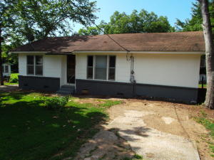Great home or rental property. All new paint inside and out. Re-finished hardwood floors in hall, bedrooms, and living room. New vinyl in kitchen, laundry, and dining room. Large lot with 24 X 32 shop with concrete floors. Also comes with a storm shelter. Great neighborhood! This one won't last long at this price!