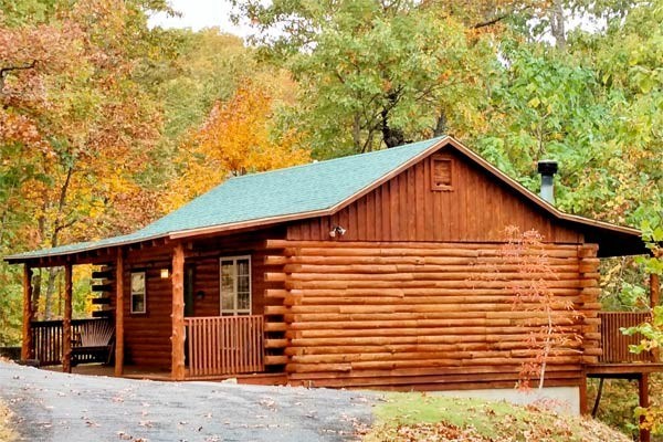 Successful luxury cabin rental business near beautiful Beaver Lake. Beautiful acreage on secluded but paved road close to everything Beaver Lake and Eureka Springs has to offer. 9 acres with 4 two story 1536 sf luxury cabins all fully and beautifully decorated, office building with coin-op laundry, well house and heated swimming pool. Pet and family friendly generates a well-established repeat client base. Completed in 2007. Has 3 undeveloped acres for additional cabins. Owner’s custom 2800 sf home available separately. Located just 5 minutes from Beaver Dam and Starkey Marina and only 15 minutes to historic Eureka Springs.