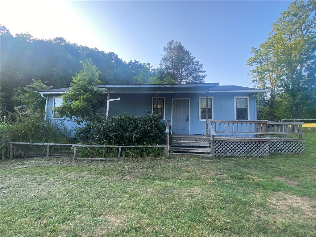 Great potential near the Little Mulberry River and the Oark General Store. Formally used as an office and a rental, this property will make a great AirBnb or a permanent home for someone looking to make a gret investment.