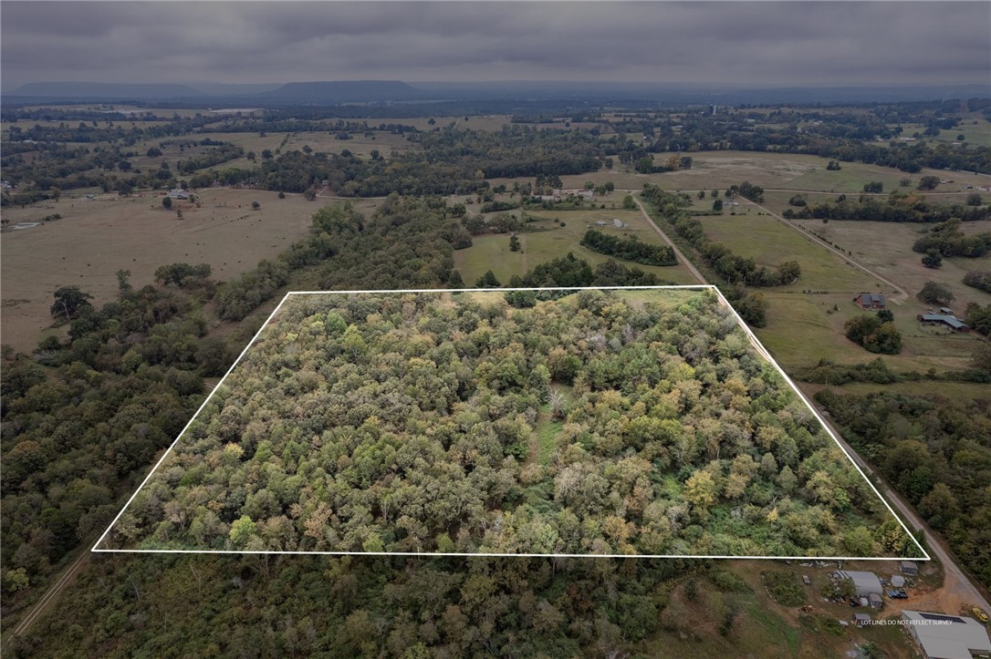 Build Your Dream Home or Create a Hunterās Paradise on 17.48 Acres! Discover the perfect blend of privacy and natural beauty on this wooded retreat. With water and electric available at the street, this serene property offers multiple ideal building sites surrounded by mature trees and abundant wildlife, including deer, turkey and a variety of native speciesāperfect for nature lovers or outdoor enthusiasts.
Rock fence borders part of the land, adding rustic character as you walk the property.New 10x12 storage building. Only 6 miles from the Arkansas River, enjoy easy access to boating, fishing, and hiking. You'll also be close to great local restaurants,shopping, entertainment, 25 miles to Byrd's Aventure Center and just 45 miles from Fort Smith.
Whether you're dreaming of a secluded homestead, a weekend getaway, or a hunterās haven, this property offers endless potential.