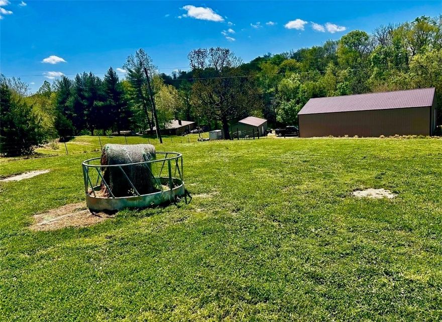 Want to trade in your worries for a peaceful slice of heaven?  You’ve found it!  Don’t miss this three bedroom, two-bath home, tucked away in a serene country setting that’s just a hop, skip and a jump from town.  Picture yourself unwinding on the porch, watching the sunset’s kaleidoscope of colors.  If preserving fruits is your jam, you’ll adore the peach tree and plum tree.  The raspberries and blackberries are a bonus.  There are two outbuildings that have enough space for your toys and upcoming hobbies.