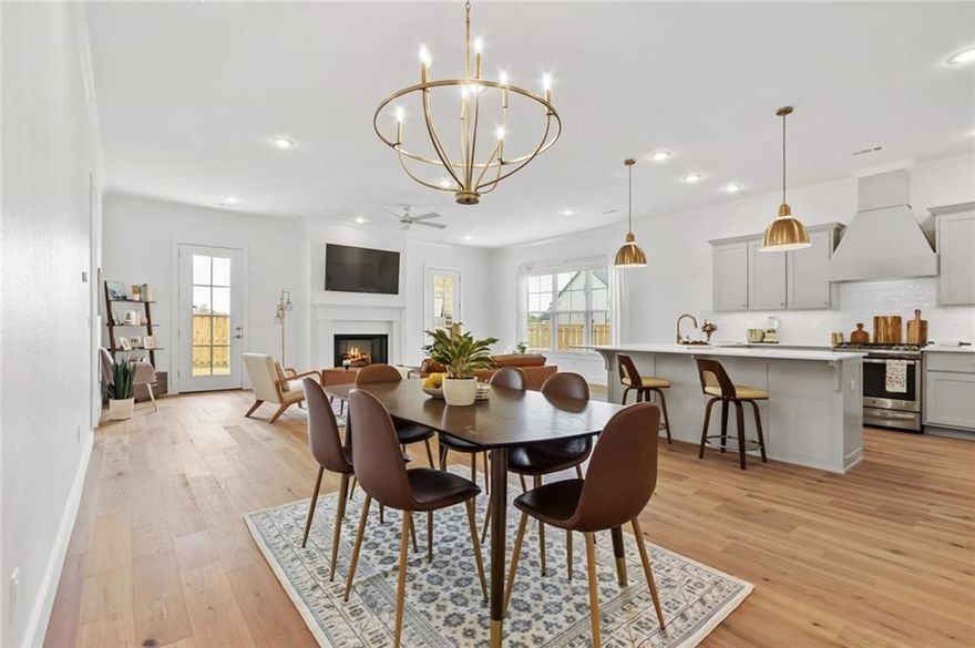 Stunning executive rental in a highly convenient location! This beautifully designed home offers four bedrooms and two bathrooms with a spacious open-concept layout. The inviting foyer flows seamlessly into the dining, kitchen, and living areas, highlighted by vaulted ceilings, smart home features including a Nest thermostat and Ring doorbell, walk-in closets, quartz countertops, and stainless steel appliances. Washer, dryer, and refrigerator along with internet service are included for added convenience. Enjoy a large fenced backyard with covered patio. Community amenities include a pool, clubhouse, playground, and pickleball courts. Conveniently located near top-rated Bentonville schools, XNA, the Bentonville Community Center, medical facilities, shopping, and dining.