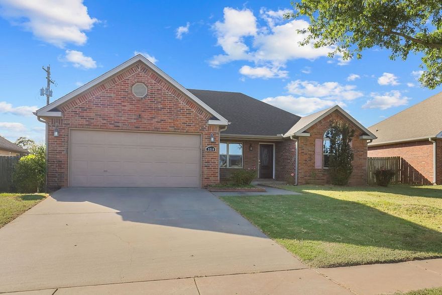 This thoughtfully designed home features a split floor plan that offers privacy and functionality. The primary bedroom suite is generously sized with a walk-in closet, double vanity, luxurious jacuzzi tub, walk-in shower, and a linen closet. On the opposite side of the home, you'll find 2 additional bedrooms, 1 with vaulted ceilings, sharing a well-appointed bathroom with a tub/shower combo. The heart of the home features an eat-in kitchen with wood grain cabinets, electric range, and dishwasher, plus a pantry and washer/dryer connections. Ceramic tile and carpet flooring flow throughout, while a cozy gas log fireplace adds warmth and ambiance. Recent updates include a new  roof installed last year and a water heater in 2018. Practical features include double pane vinyl windows, full perimeter gutters with French drains, and a water softener system. Step outside to enjoy covered patios both front and back, perfect for relaxing in your backyard. This home combines comfort, convenience, and quality updates.